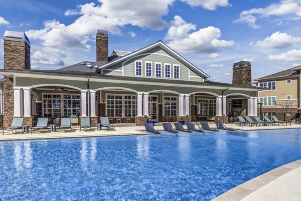 Resort-style pool at Residences at Shiloh Crossing Apartments, offering luxury leisure in a serene setting