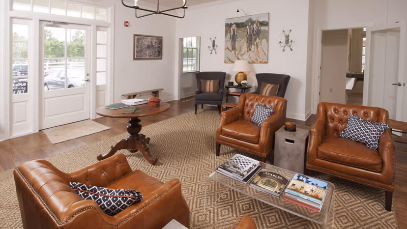 Modern clubhouse featuring luxurious seating and social spaces at Carrington at Schilling Farms Apartments in Collierville
