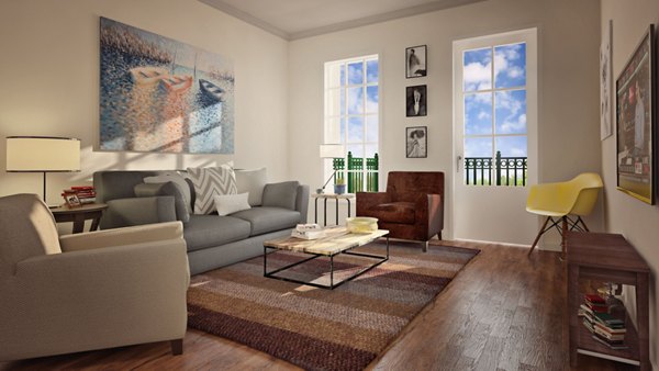 Spacious living room with modern furnishings at Carrington at Schilling Farms Apartments