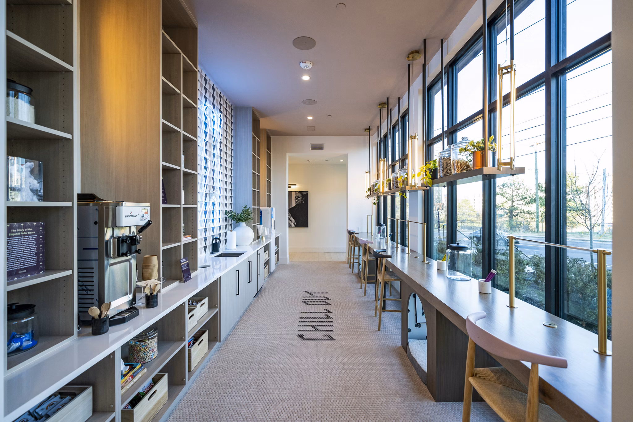 Modern clubhouse with interactive spaces at Novel Edgehill Apartments, luxury living by Greystar