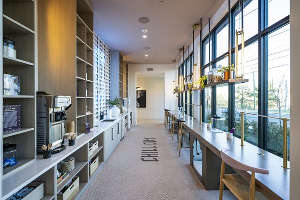 Modern clubhouse with interactive spaces at Novel Edgehill Apartments, luxury living by Greystar