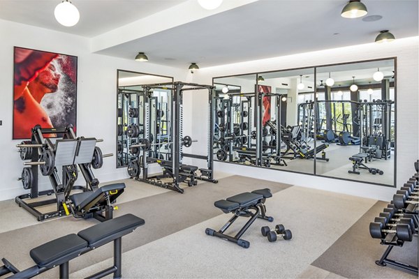 Modern fitness center with state-of-the-art gym equipment at Novel Edgehill Apartments