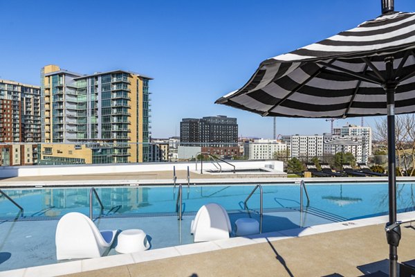 Stunning outdoor pool area at Novel Edgehill Apartments, offering luxury amenities for residents