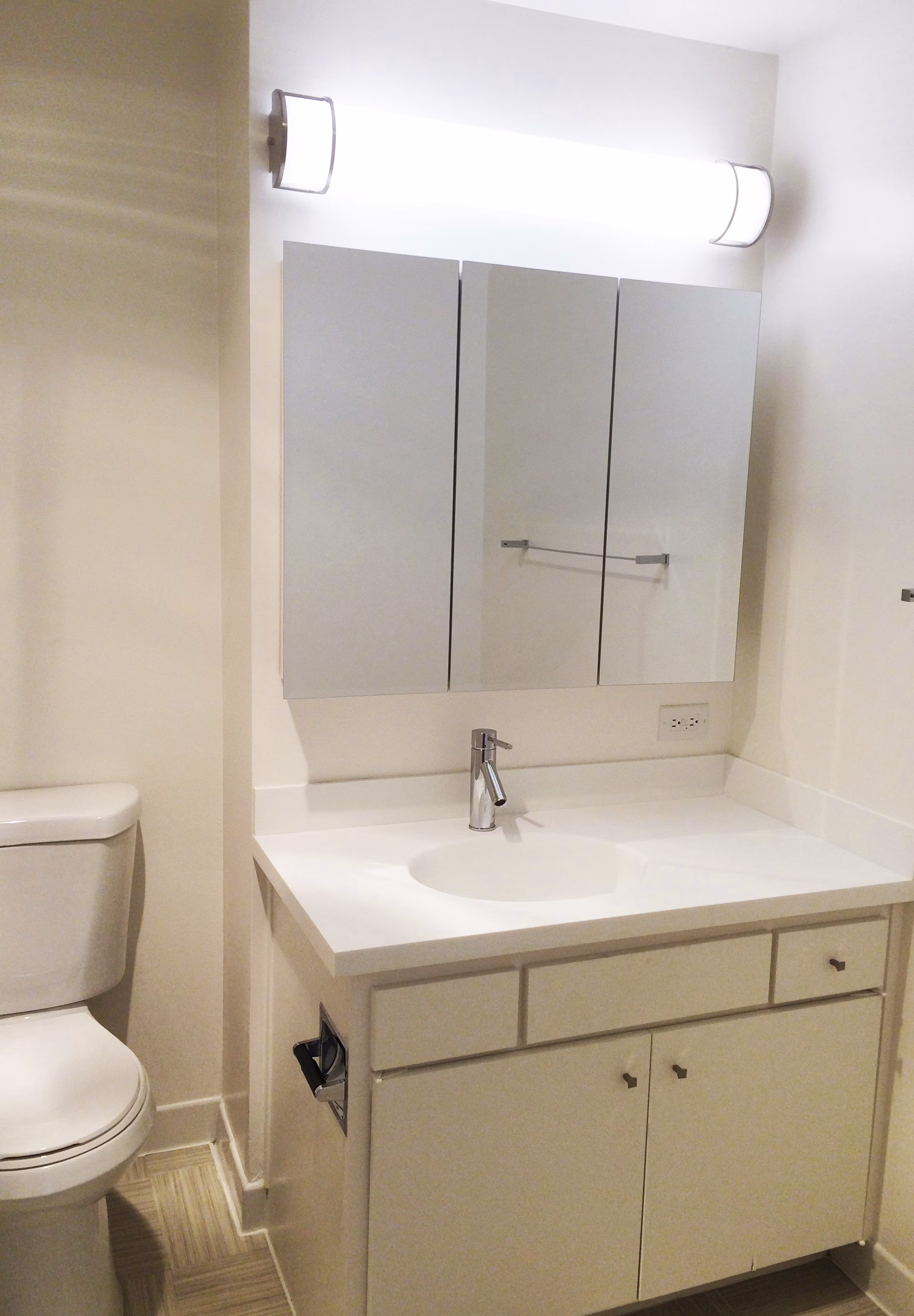 Bathroom featuring modern fixtures and elegant marble tiles at Cathedral Hill Plaza Apartments, a Greystar luxury property