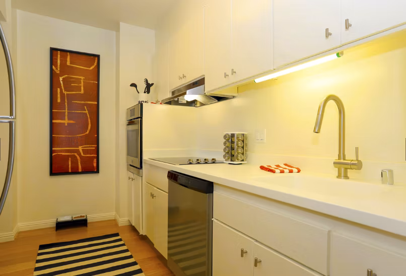 Modern kitchen with sleek appliances in Cathedral Hill Plaza Apartments