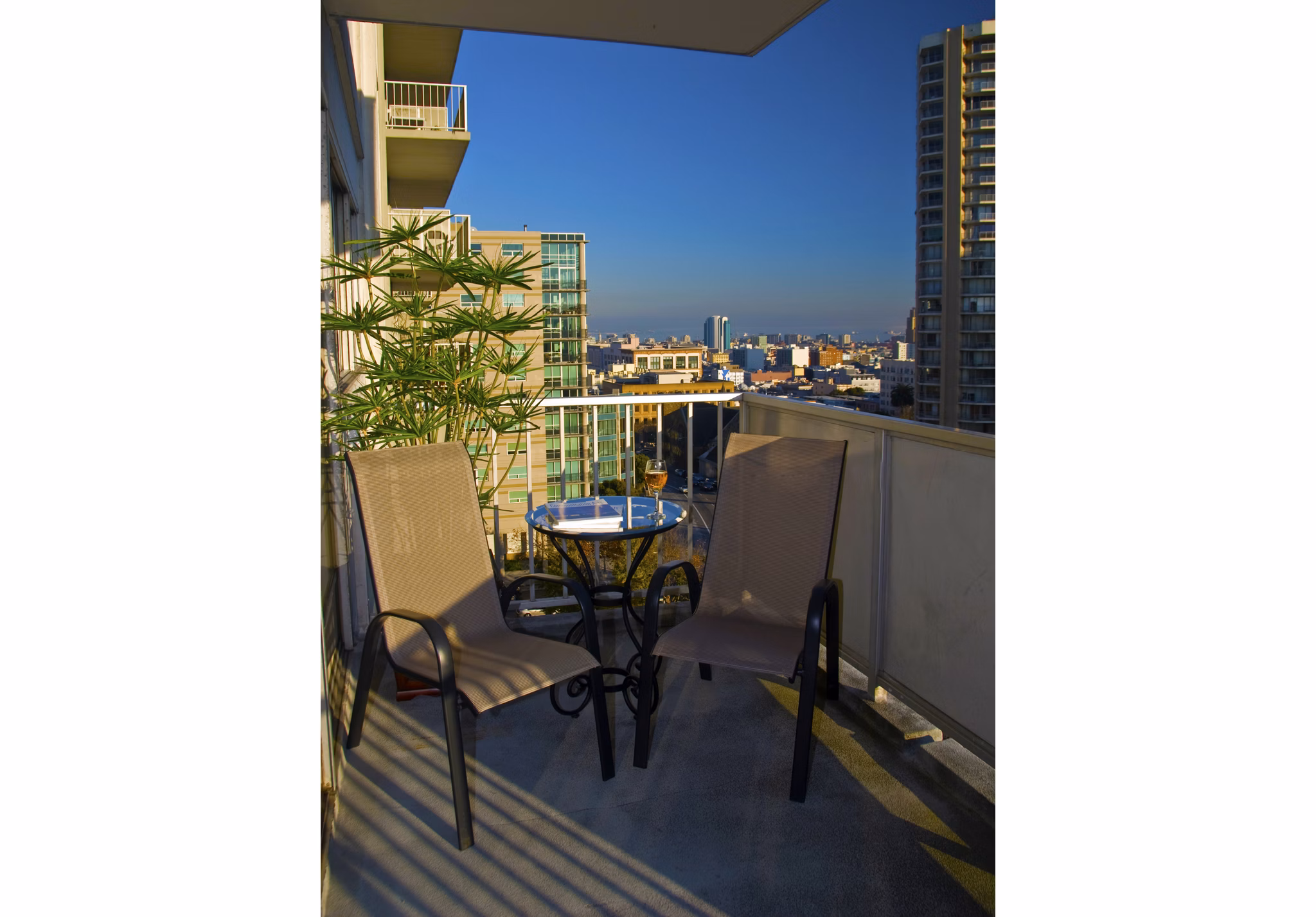 Chic patio with seating at Cathedral Hill Plaza Apartments, a luxury  property