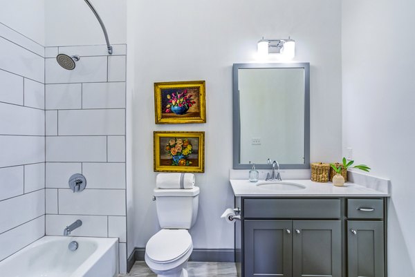 Luxurious bathroom with sleek fixtures in Town Center at Berry Farms Apartments