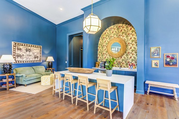 Clubhouse featuring modern design elements at Town Center at Berry Farms Apartments, luxury living in the vibrant Berry Farms community