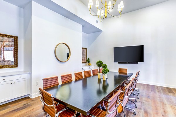 Luxurious clubhouse with modern decor at Town Center at Berry Farms Apartments, featuring community spaces and social gathering areas