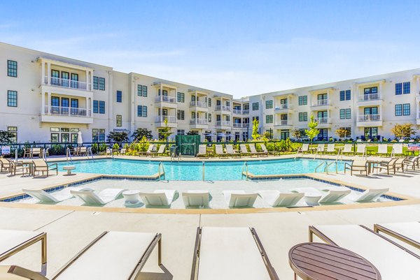 Expansive pool with stylish decking at Town Center at Berry Farms Apartments, a Greystar luxury community in Nashville