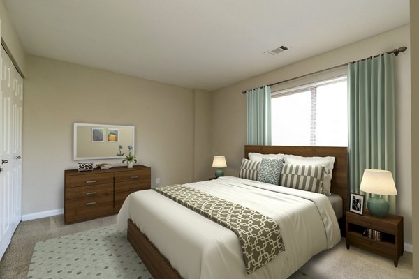 Cozy bedroom with modern decor at Avana Stoney Ridge Apartments