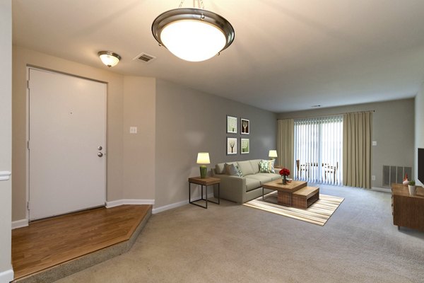 Spacious living room with modern decor at Avana Stoney Ridge Apartments