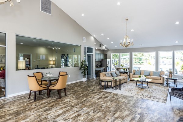 Modern clubhouse lobby with elegant seating at Ravens Crest Apartments, luxury living destination