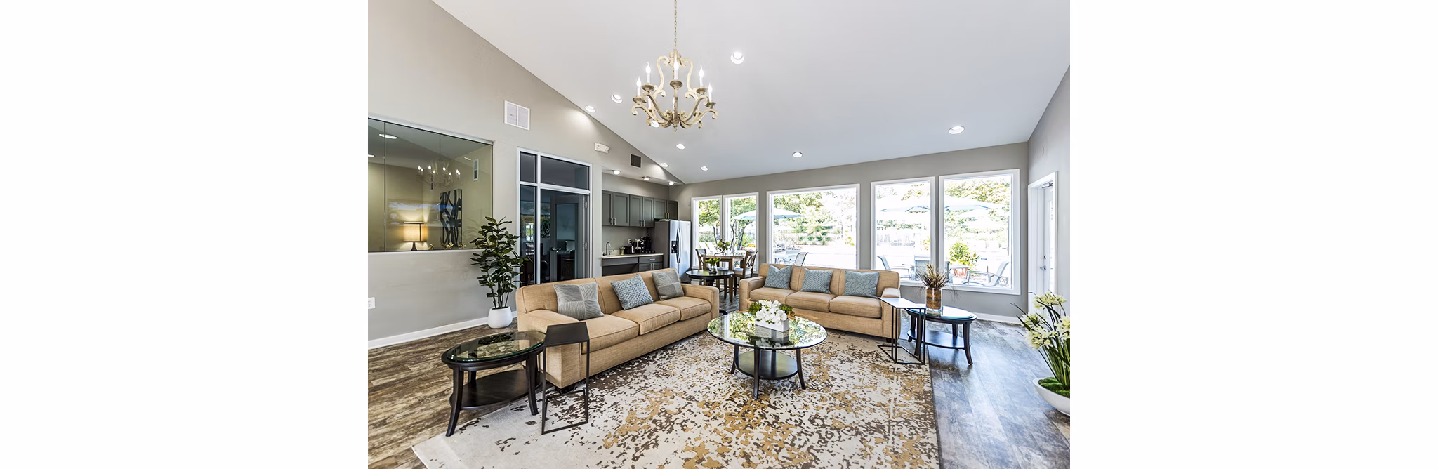 Modern clubhouse and lobby at Ravens Crest Apartments featuring contemporary design and cozy seating areas