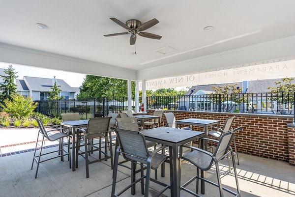 pool patio/grill area at Ravens Crest Apartments