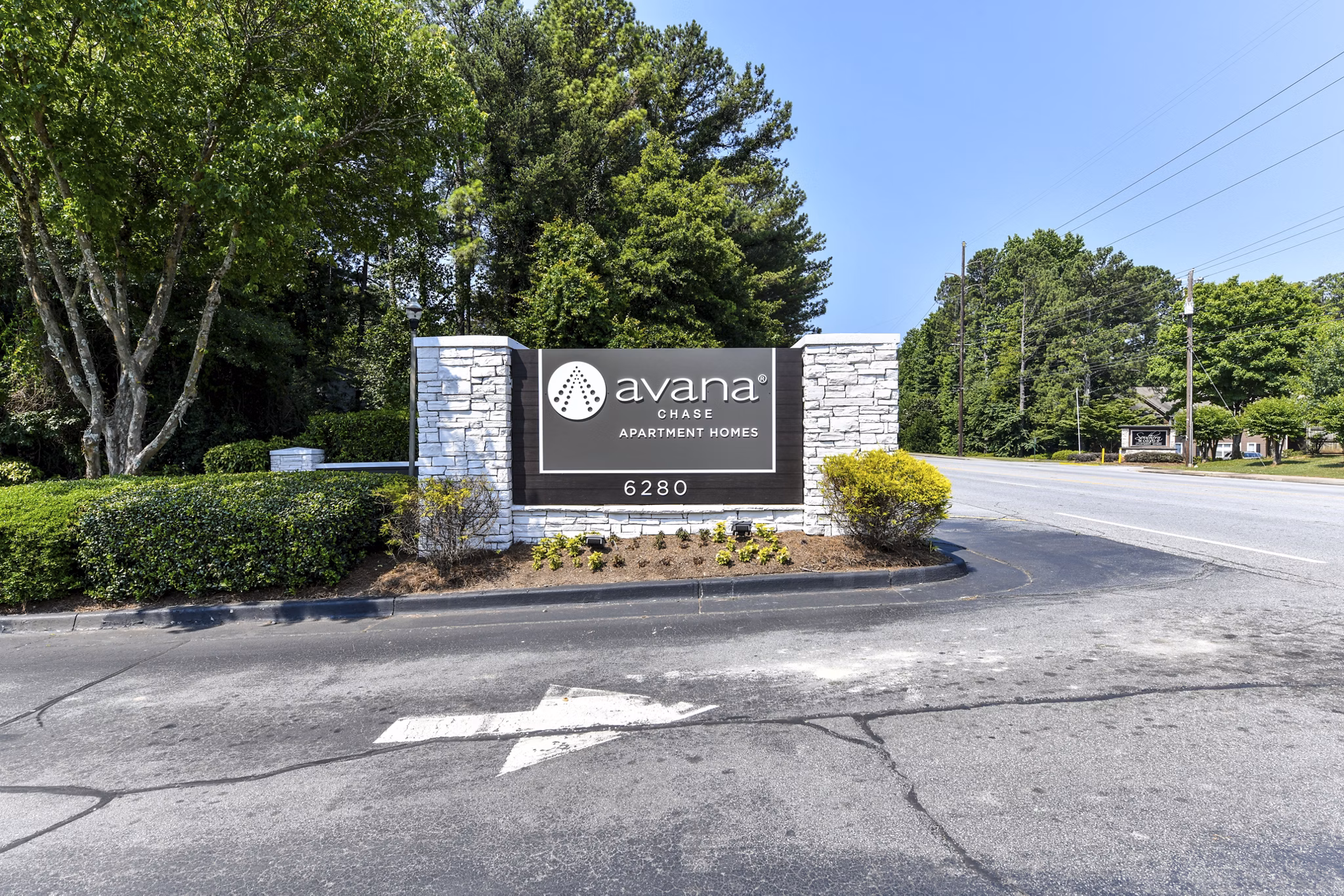 Signage at Avana Chase Apartments luxury community, showcasing modern design and branding in an inviting atmosphere