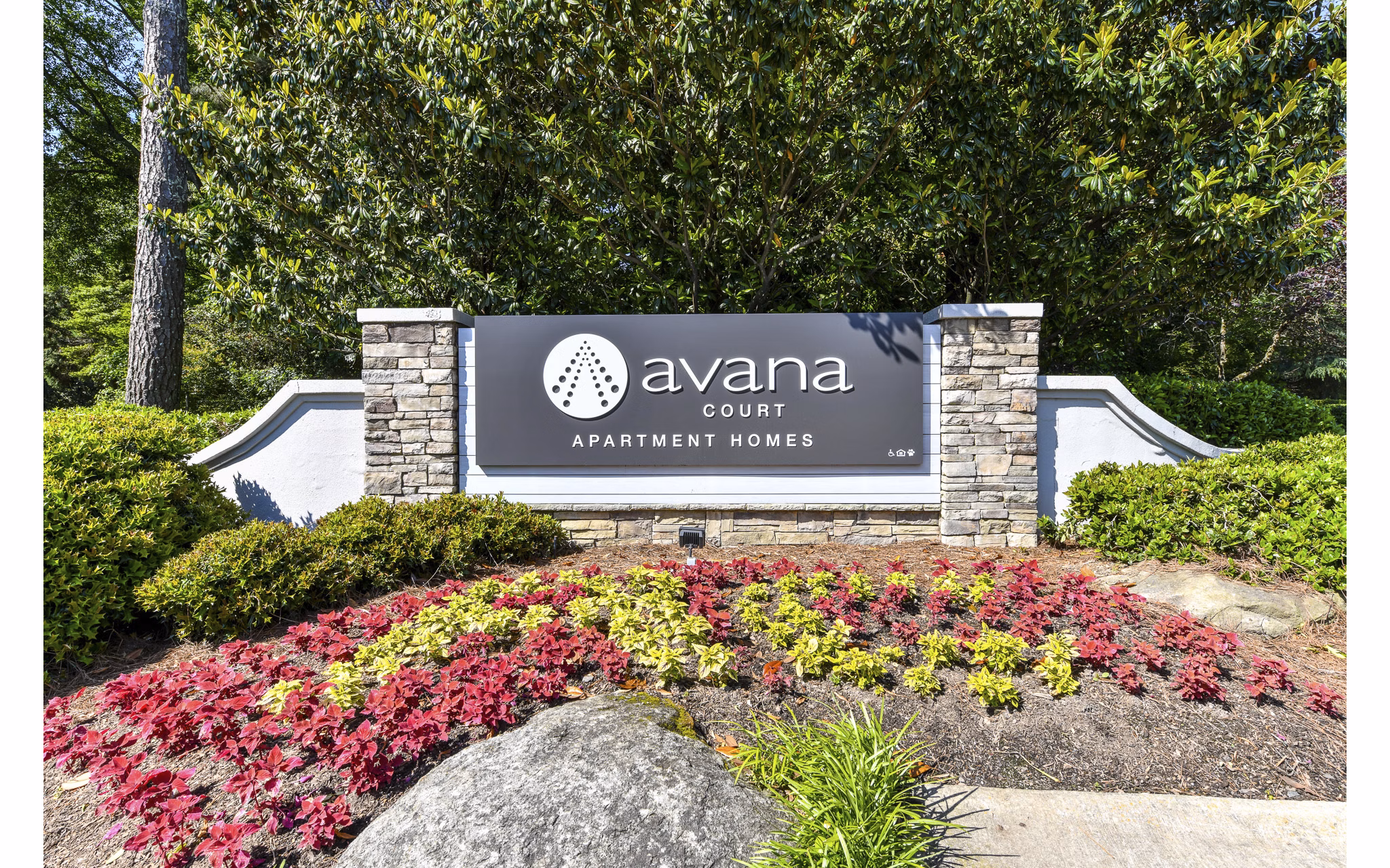 Avana Court Apartments: Modern signage for luxury living in a vibrant community