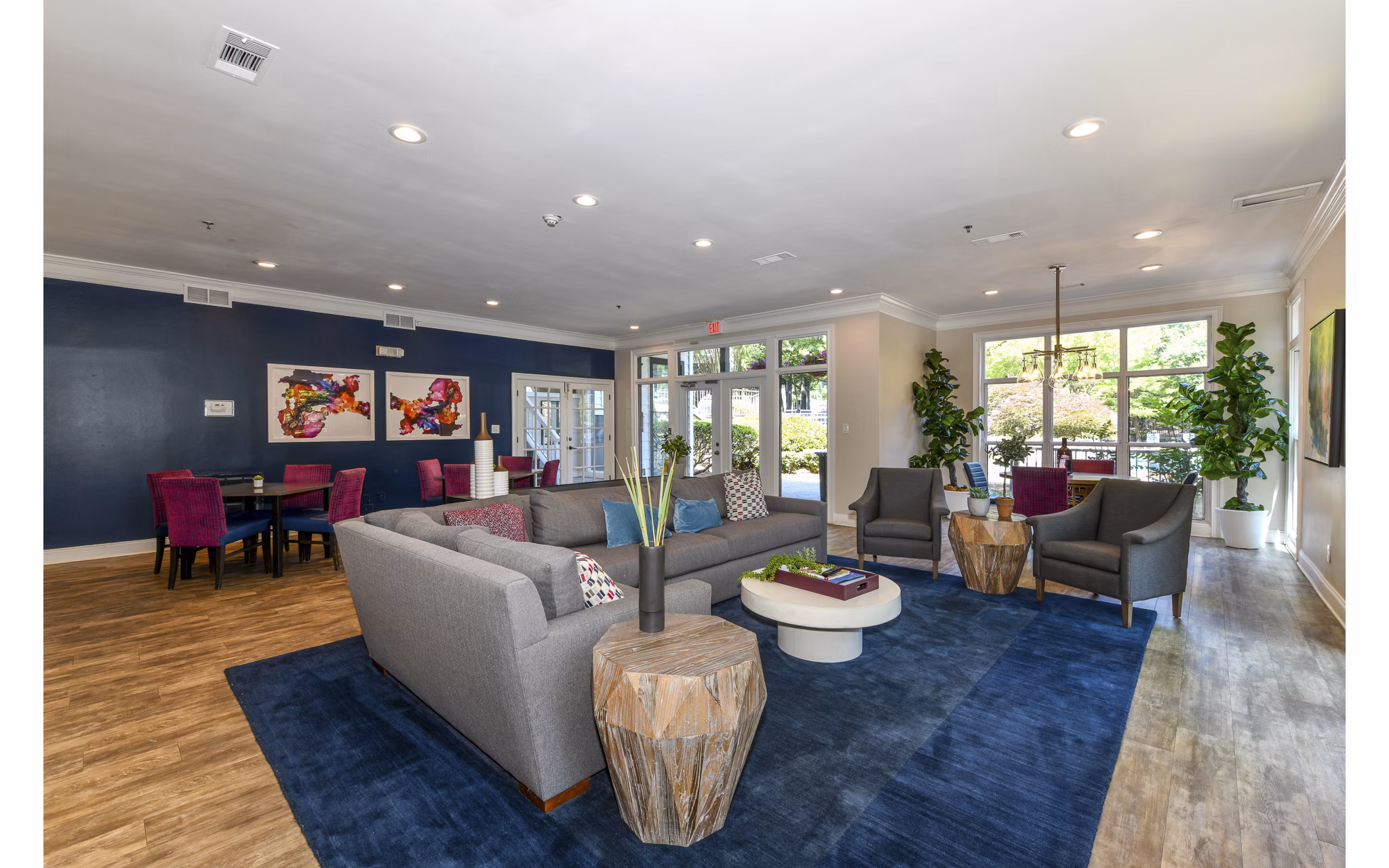 Clubhouse with modern lounge area and sleek design at Avana Court Apartments Ideal for gatherings and relaxation in a luxury community setting