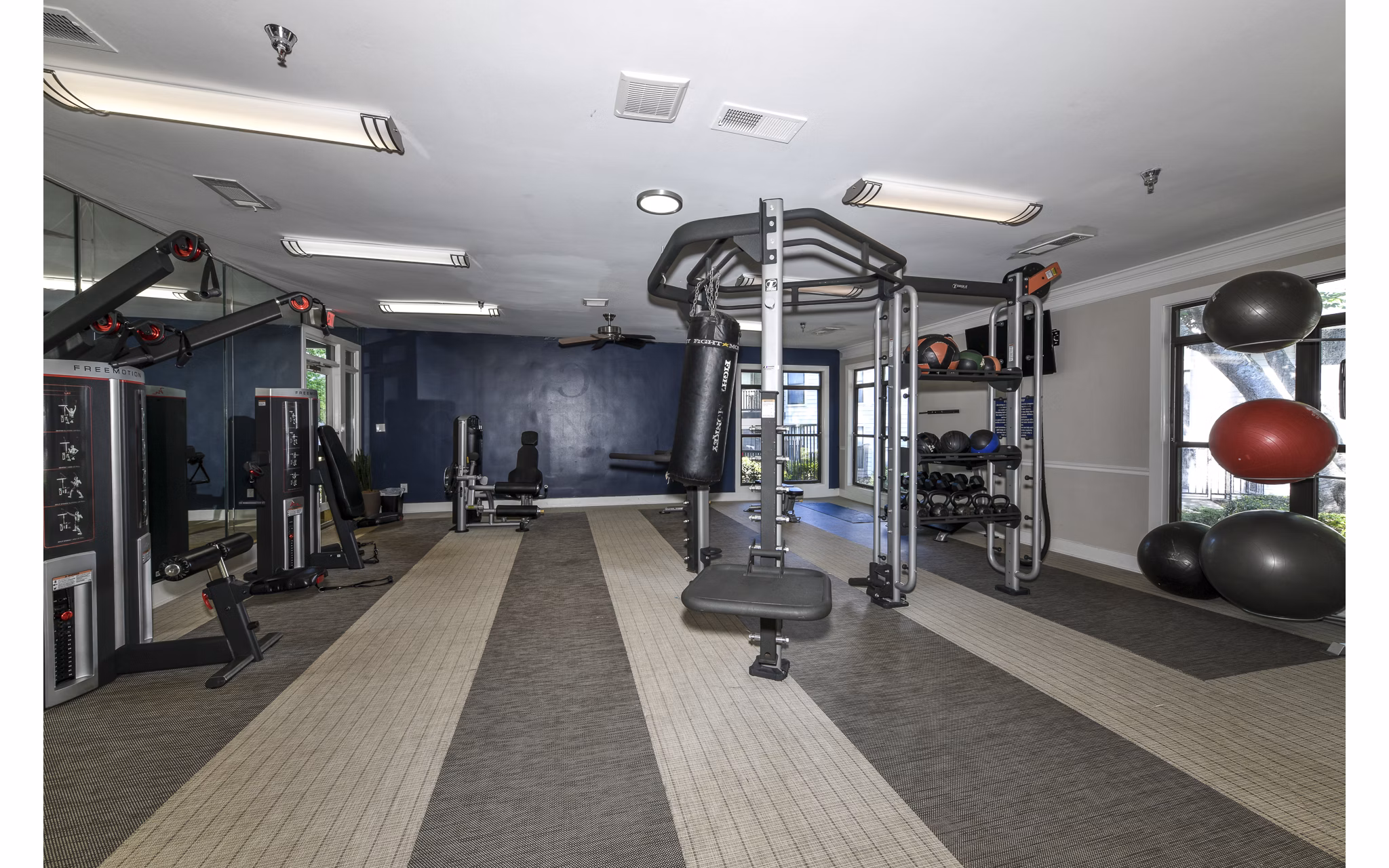 State-of-the-art fitness center with modern exercise equipment at Avana Court Apartments