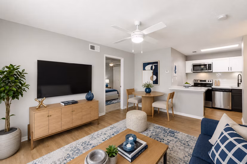 Modern living room with natural light and stylish furnishings at Avana Court Apartments