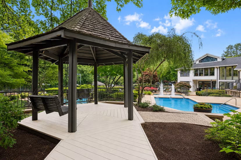 Cozy patio with modern seating at Avana Court Apartments, perfect for outdoor relaxation and city views