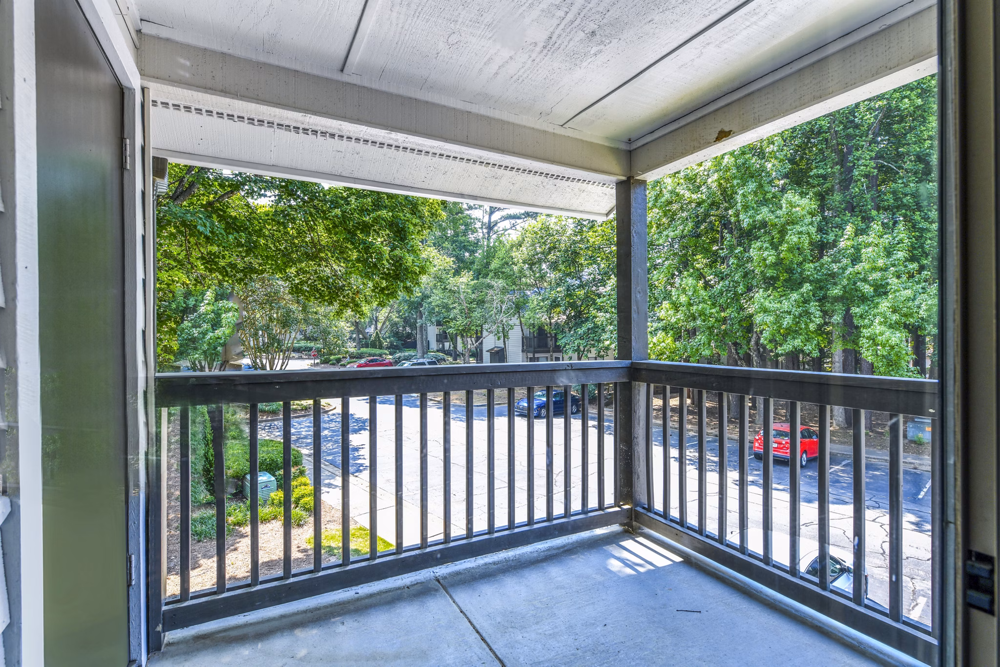 Cozy patio with modern seating at Avana Court Apartments, perfect for outdoor relaxation and city views