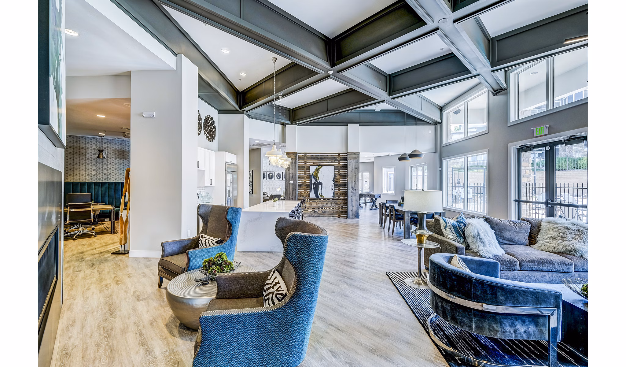 Modern clubhouse and lobby with chic decor at The Fletcher Southlands Apartments