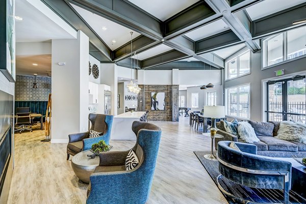 Modern clubhouse and lobby with chic decor at The Fletcher Southlands Apartments
