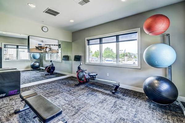 fitness center at The Fletcher Southlands Apartments