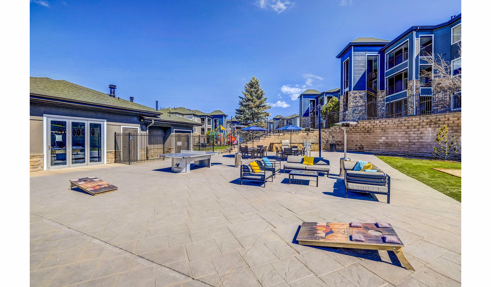 Recreational area with modern lounge seating at The Fletcher Southlands Apartments