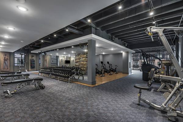 fitness center at The Academic Apartments