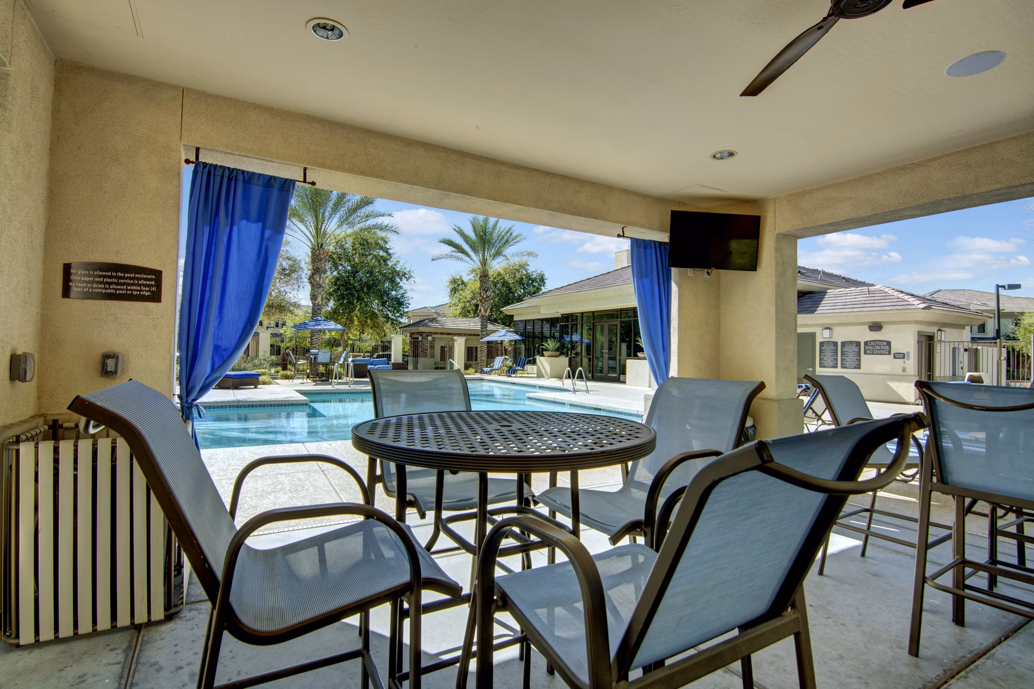 Outdoor recreational area with lush landscaping at Cobalt on 32nd Apartments for relaxation and leisure activities