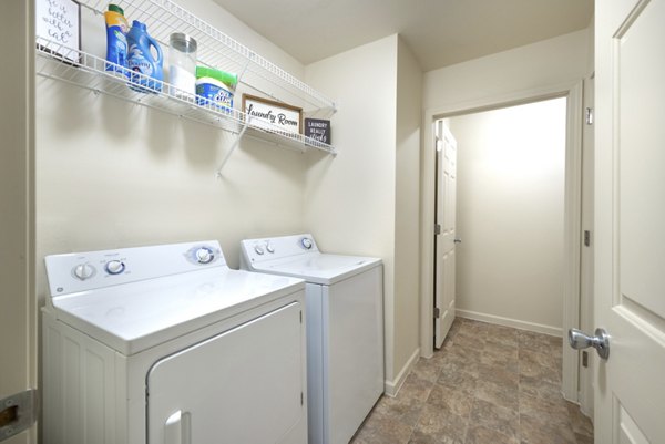 laundry room at Level 27 Apartments