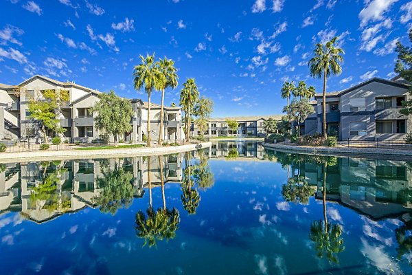 Laguna at Arrowhead Ranch: Scenic luxury apartment exteriors surrounded by natural landscapes