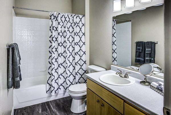 Luxurious bathroom with modern fixtures at Laguna at Arrowhead Ranch Apartments, a Greystar luxury property