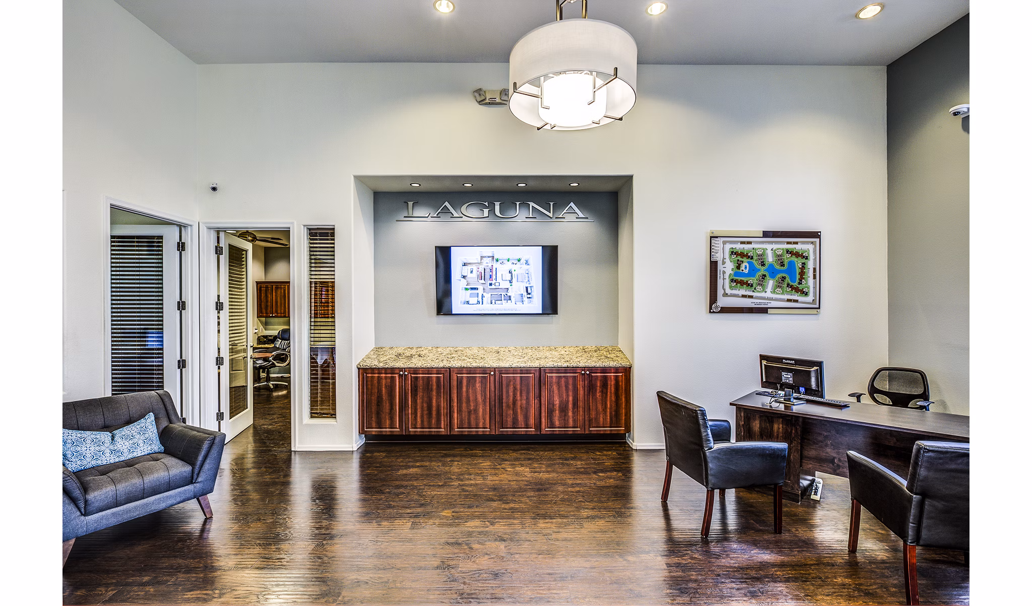 Clubhouse with modern design at Laguna at Arrowhead Ranch Apartments leasing office, perfect for community events and meetings