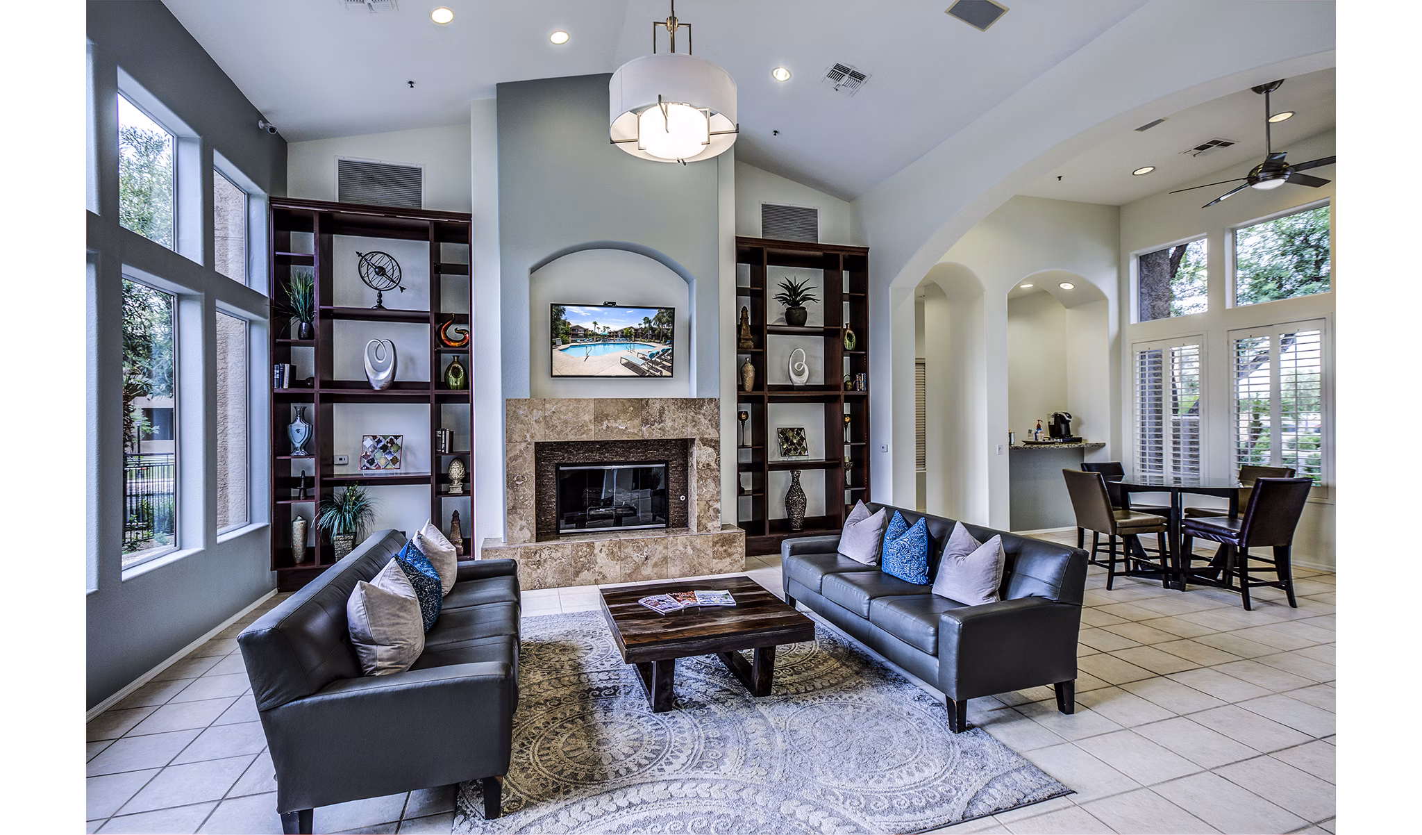 Stylish clubhouse lobby with elegant seating at Laguna at Arrowhead Ranch Apartments