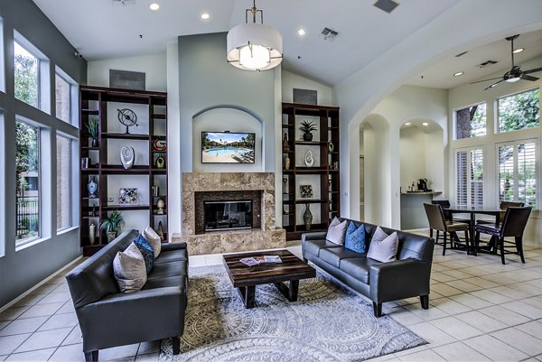 Stylish clubhouse lobby with elegant seating at Laguna at Arrowhead Ranch Apartments