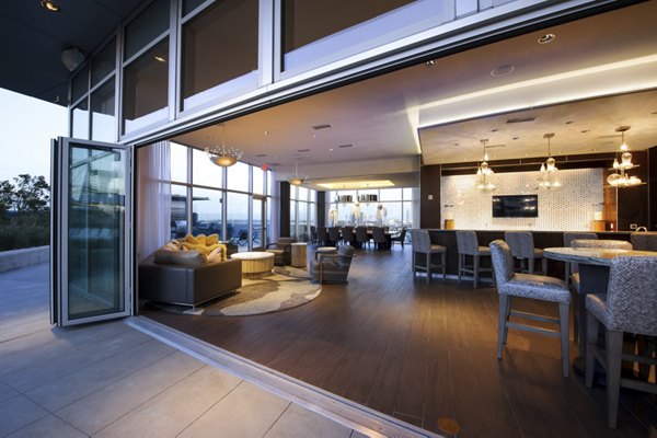 Clubhouse featuring luxurious seating and modern decor at 2929 Weslayan Apartments, a Greystar luxury community in Houston