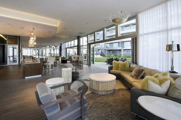 Clubhouse featuring modern dÃ©cor and expansive seating at 2929 Weslayan Apartments, a luxury community in the heart of the city