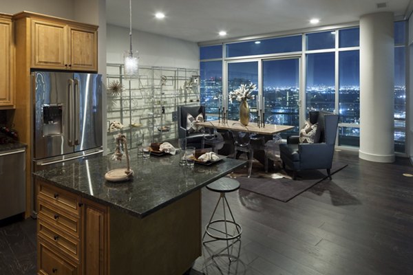 Modern kitchen and dining area with sleek finishes at 2929 Weslayan Apartments