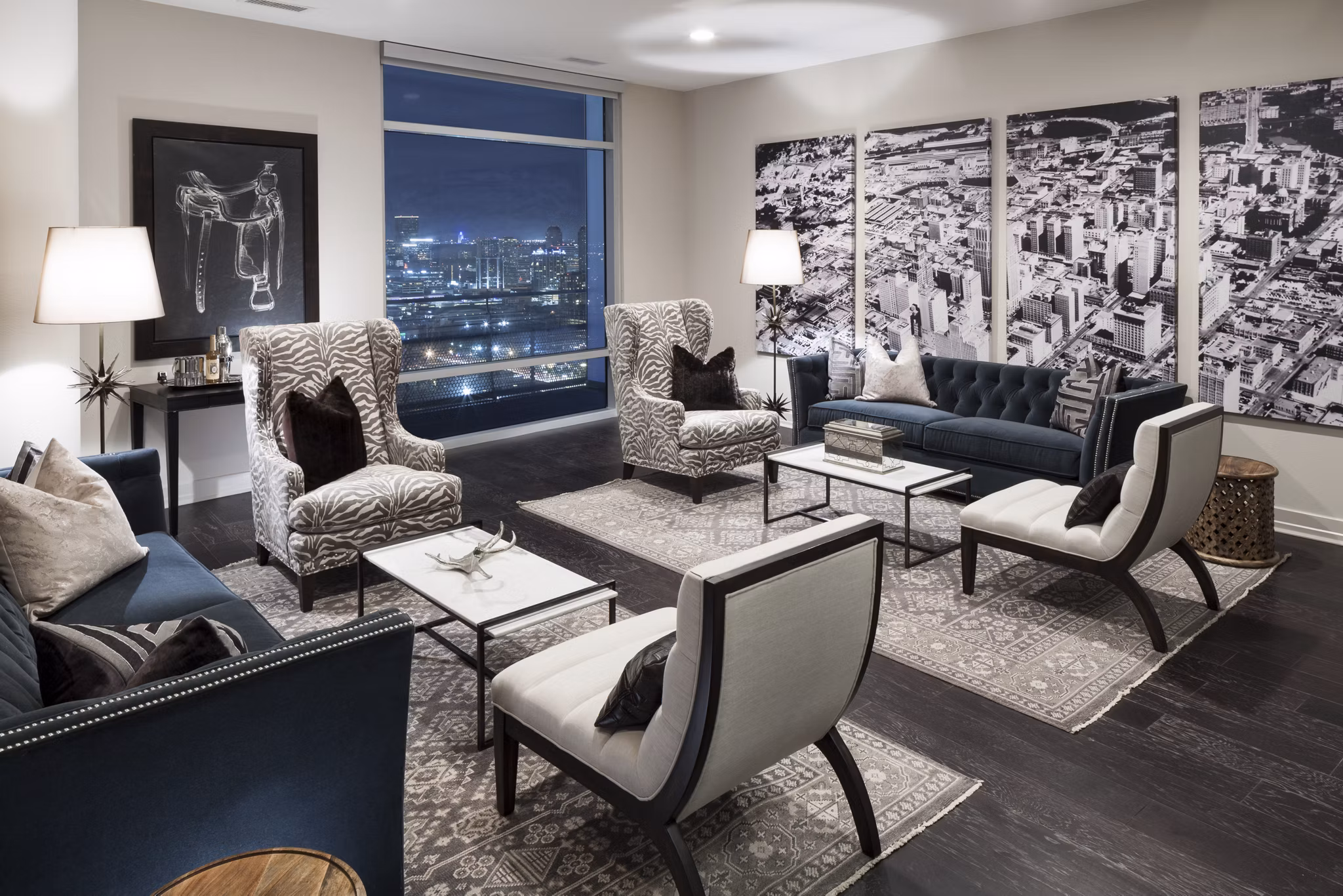 Modern living room with stylish decor and large windows at 2929 Weslayan Apartments