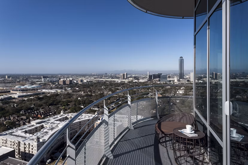 Elegant patio area with comfortable seating at 2929 Weslayan Apartments, offering luxury living in urban Houston