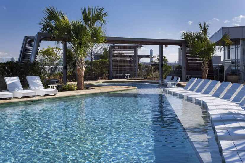 Stunning outdoor pool at 2929 Weslayan Apartments offering luxury relaxation spaces for residents in Houston