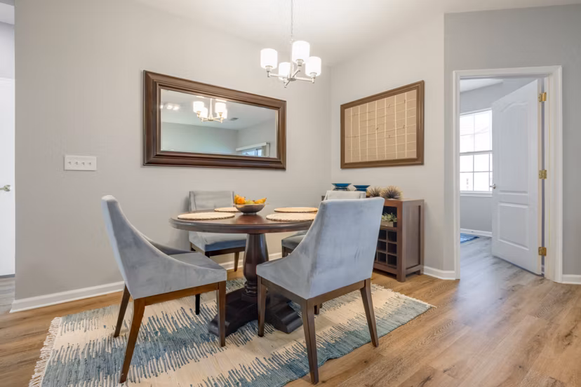 Stylish dining area with modern decor at HeatherGate at Oxford Valley Apartments, offering a luxurious living experience