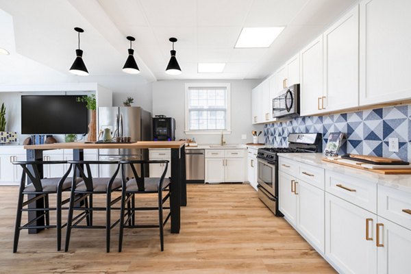 HeatherGate at Oxford Valley: Modern kitchen with sleek countertops and stainless steel appliances in luxury apartments