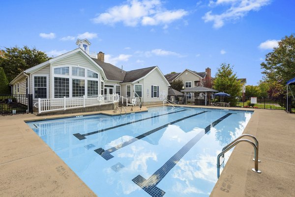 Resort-style pool with spacious sundeck at HeatherGate at Oxford Valley Apartments offering luxury living