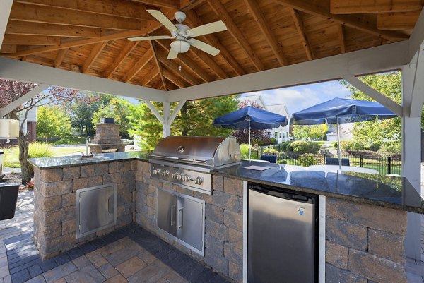 Outdoor grill area with modern appliances at HeatherGate at Oxford Valley Apartments, perfect for hosting barbecues and gatherings