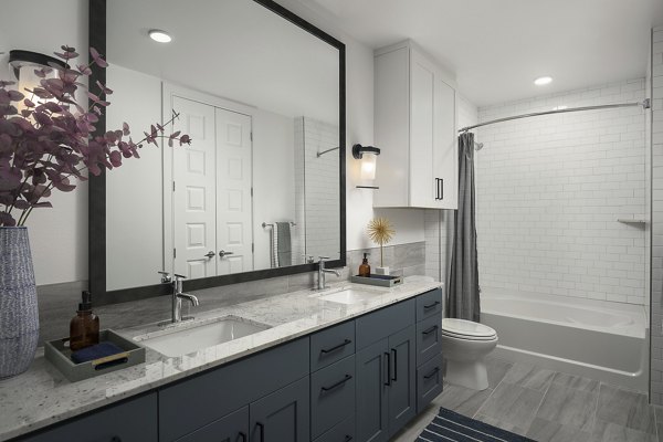 Modern bathroom with sleek fixtures at The Tyler Apartments
