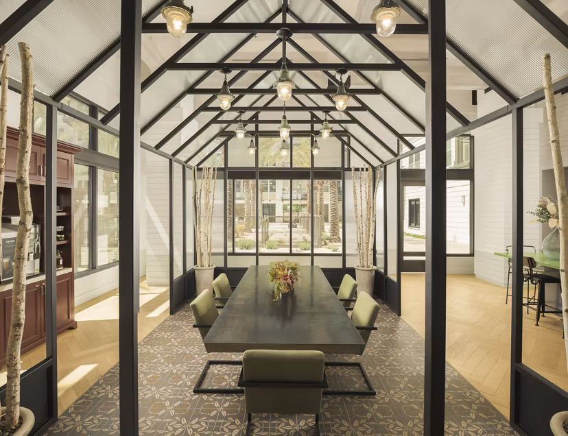 Modern clubhouse with sleek furnishings at The Tyler Apartments, offering luxury amenities in a vibrant urban setting